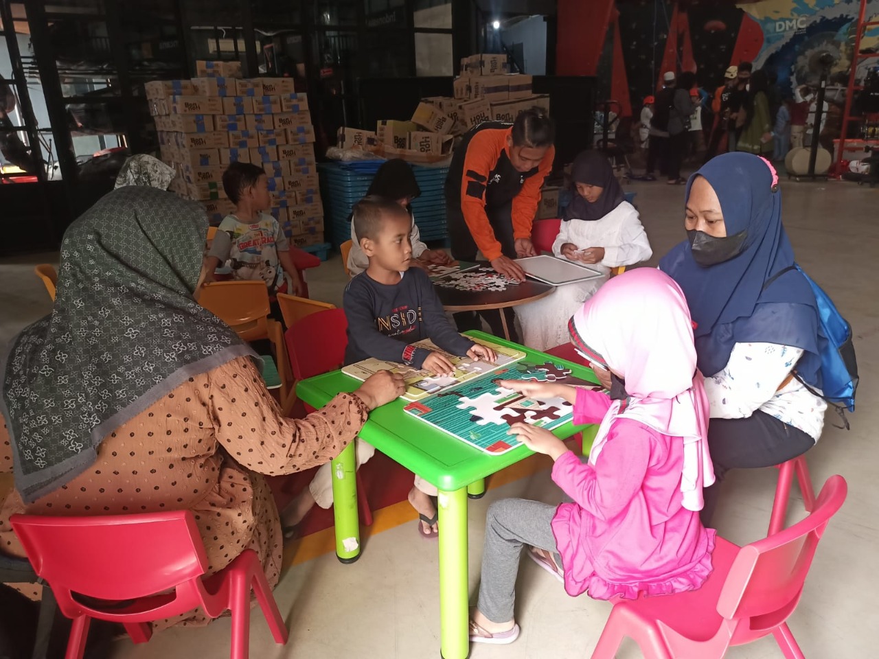  Children playing disaster-themed puzzles