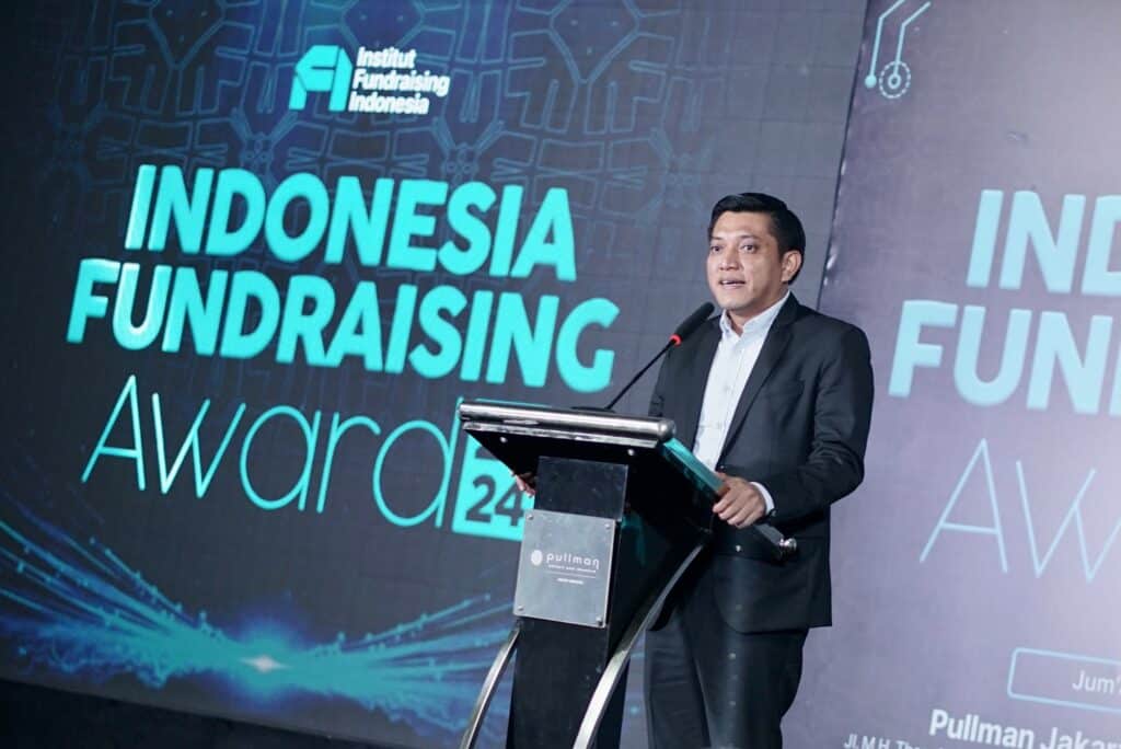 dompet dhuafa raih penghargaan ifa 20248 dompet dhuafa Perwakilan Kementerian Agama, dr. Ahmad Syauqi, menyampaikan sambutan pembuka dalam ajang IFA 2024 di Pullman Hotel Jakarta, Jumat (13/12/2024).