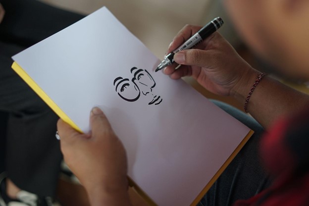 Karya Sketsa Wajah seorang donatur oleh Agah Nugraha Muharam di Konter Dompet Dhuafa, JIEXPO Kemayoran, Jakarta Pusat.