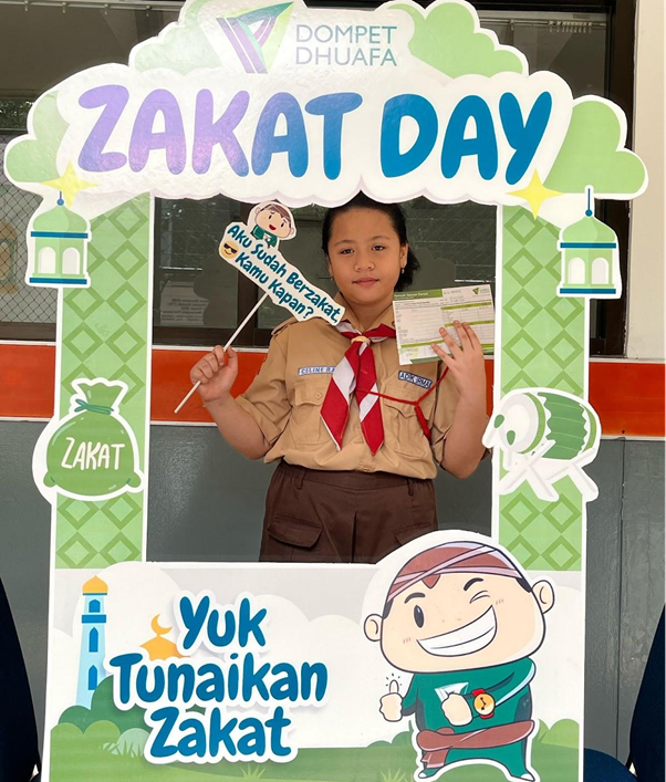ramadan ceria sd adik irma5 dompet dhuafa Siswa siswi SD Adik Irma belajar untuk membayar zakat secara mandiri melalui Zakat Day yang dilakukan Dompet Dhuafa.
