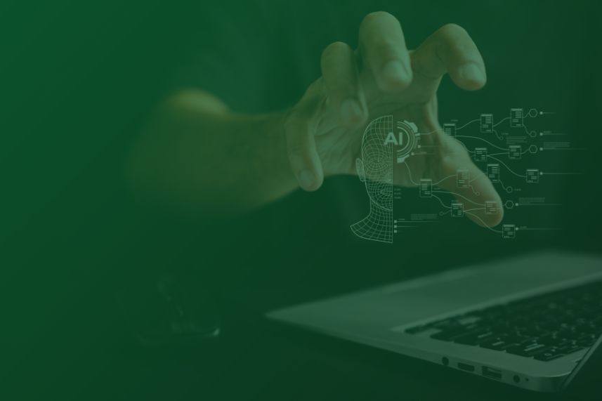 Green-tinted image of a hand reaching toward a wireframe AI head with circuits flowing from a laptop, symbolizing artificial intelligence.