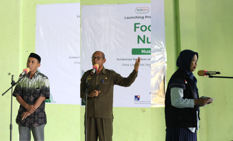 nusadayantt3768x464 dompet dhuafa Three speakers stand at microphones in front of banners during a community health event about food and nutrition.