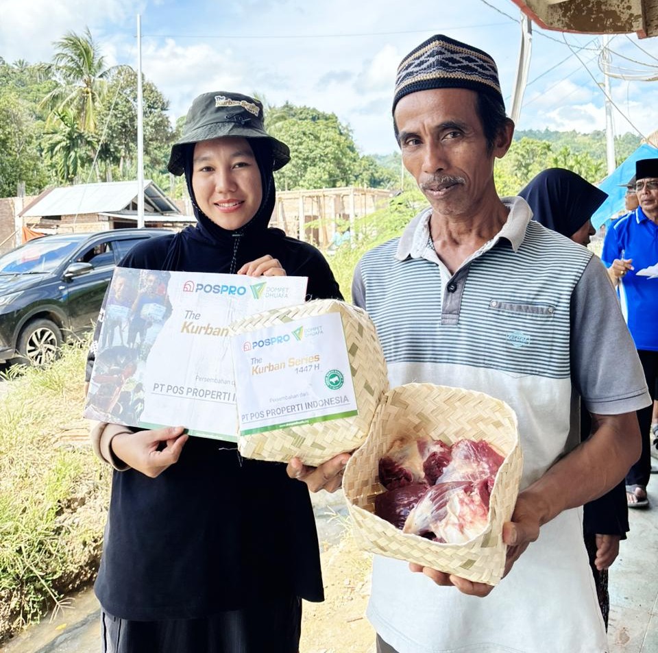 img20260604wa0003jpg dompet dhuafa Woman in a black hijab and a man in a patterned cap display a wicker basket of meat and a certificate during a Kurban charity handout.